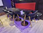 Black restaurant chair with faux marble restaurant table