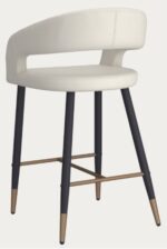 Beige counter height stool for restaurants with black legs and gold accents